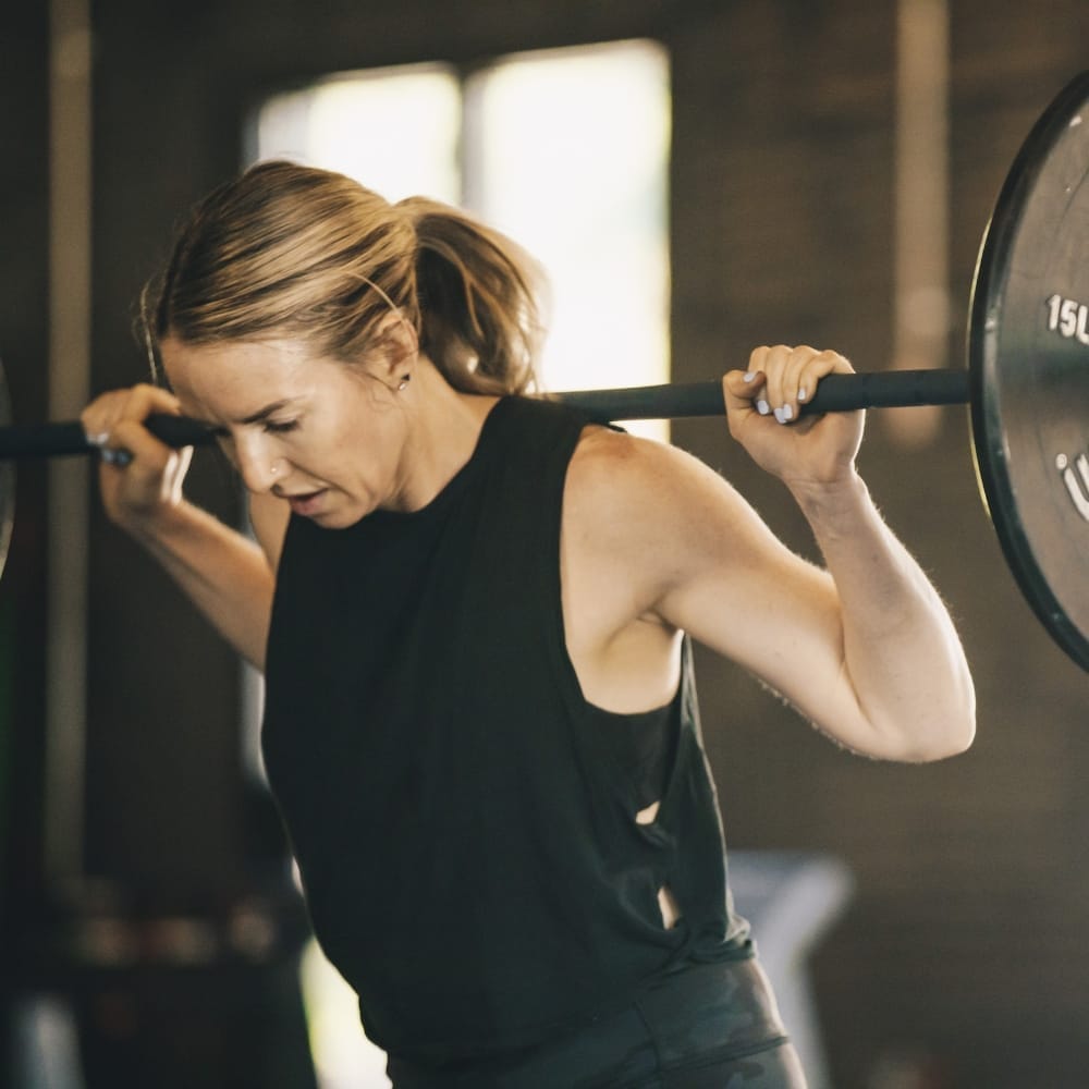 woman lifting heavy weights at CrossFit PTC